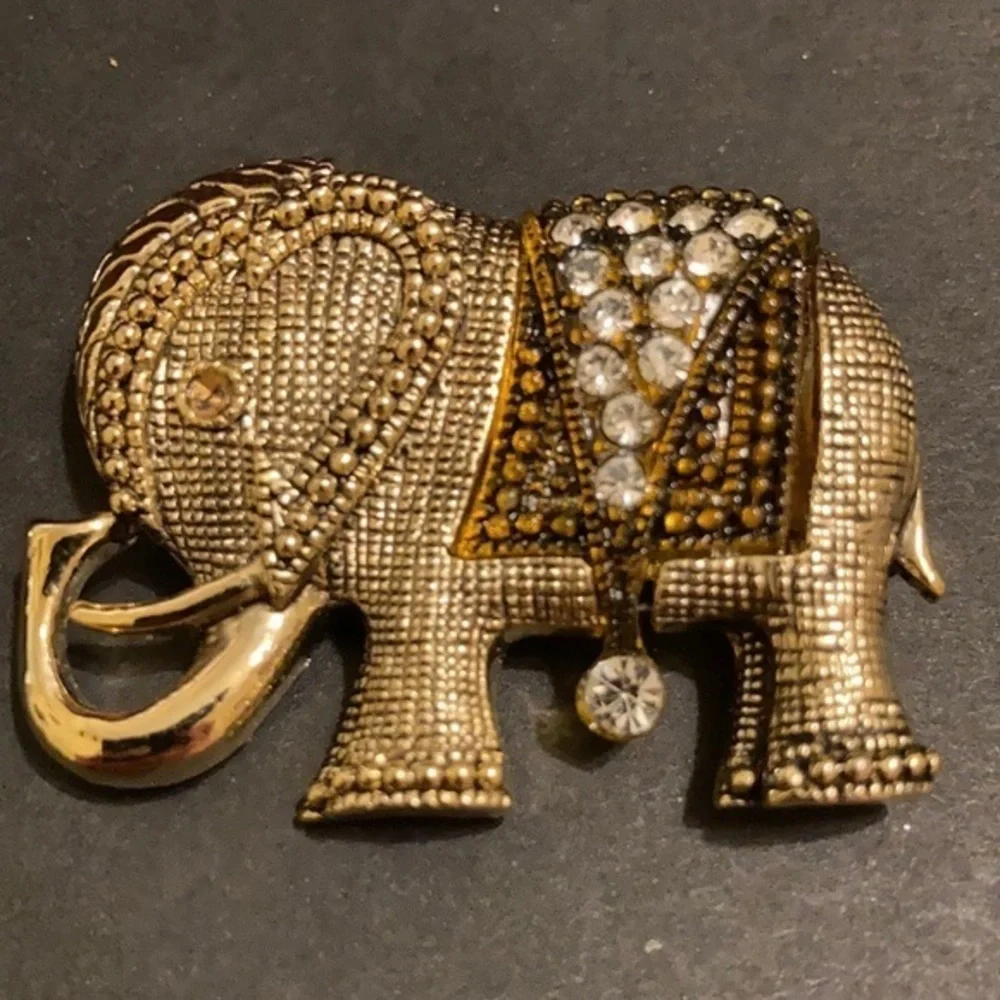 Gorgeous gold tone and crystal elephant brooch